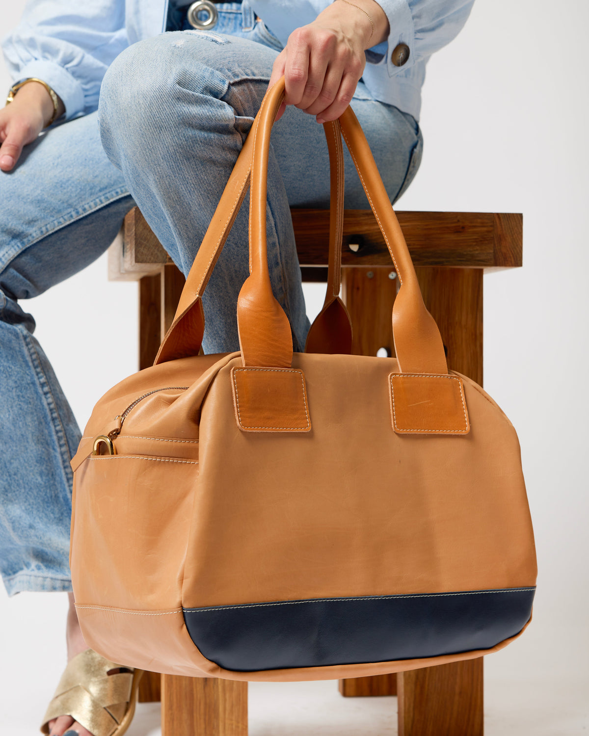 TWO COLOR LEATHER DUFFEL