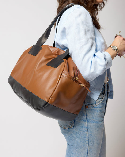 TWO COLOR LEATHER DUFFEL