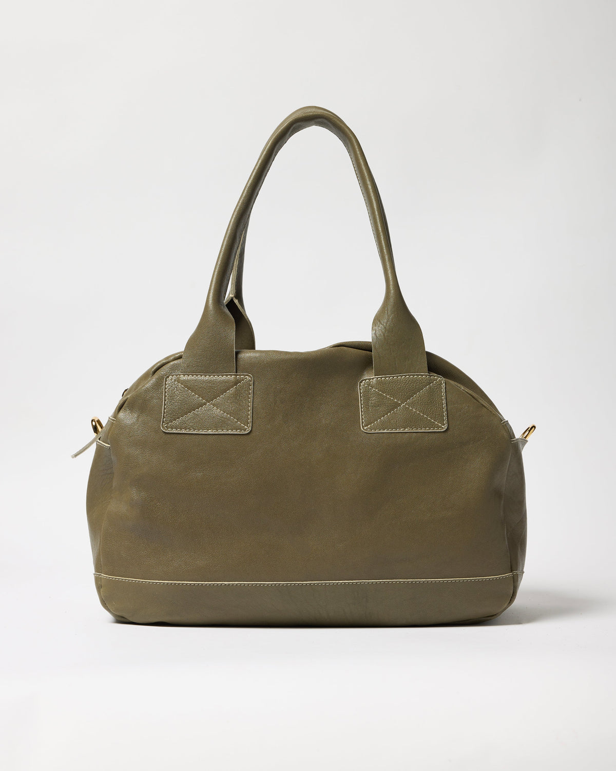 An olive green leather handbag with dual top handles, a curved dome silhouette, and decorative stitched square details on the front, shown against a plain light gray background.