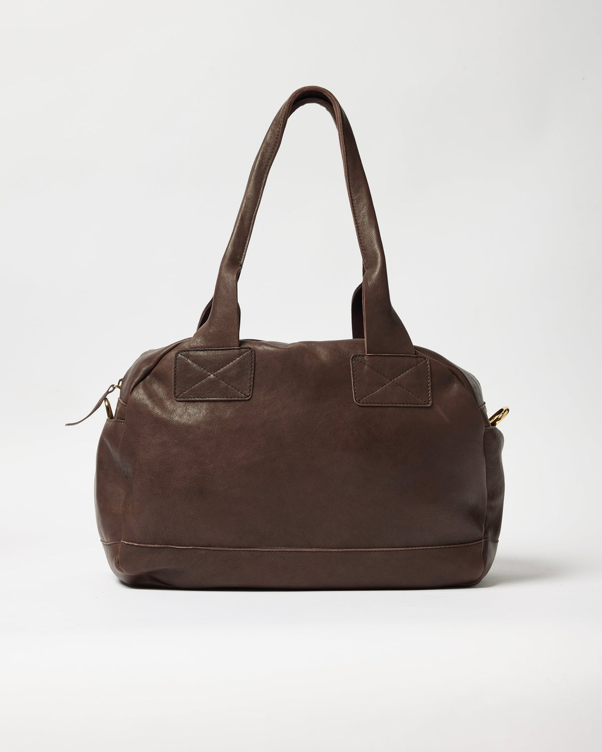 A dark brown leather duffel bag with dual top handles, a zippered main compartment, and a small side zipper, shown against a plain light gray background.